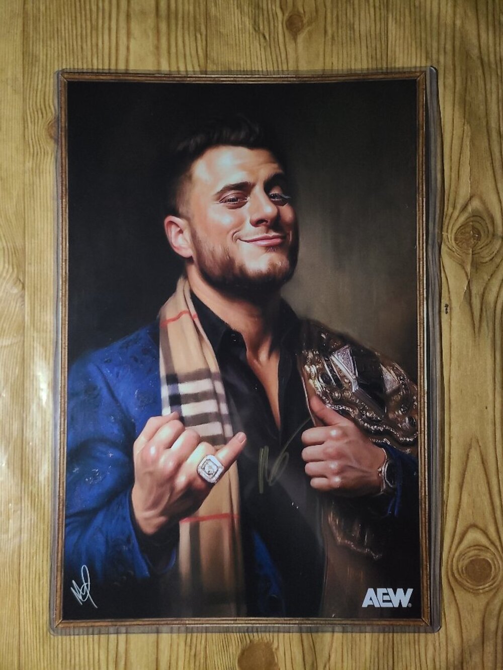 MJF AEW official autographed 12"X18" print in top loader plastic